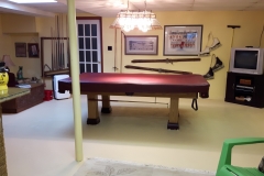 After Unused Portion of Lower Level into a Games Room